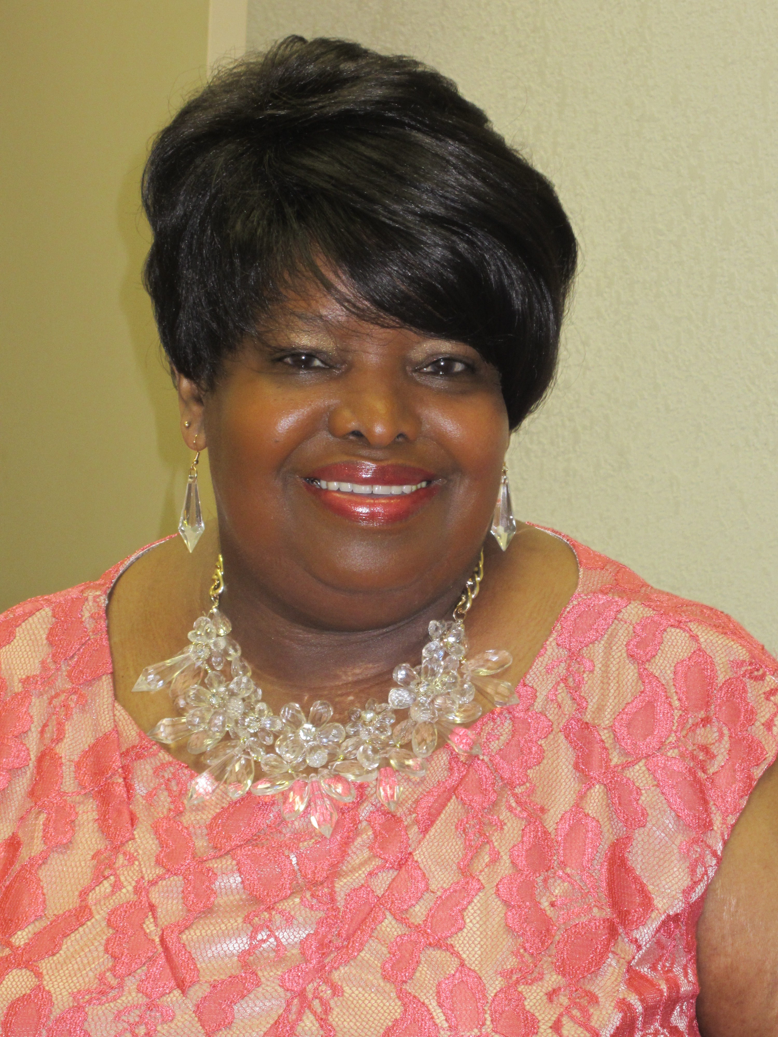 June Small,
 Administrator/Deacon